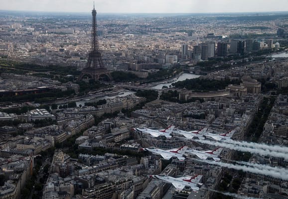USAF Thunderbirds Soar Over Paris, Normandy Beach, And More In Preparation For Bastille Day Flyover